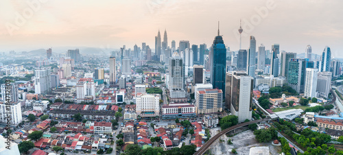 Panorama cityscape of Kuala Lumpur skyscraper with colorful sunrise sky, Malaysia.