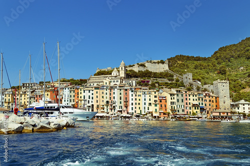 View from the sea on beautiful village Porto Venere located on Ligurian coast of Italy. Small Italian resort town in Cinque Terre Park. Retro toning.