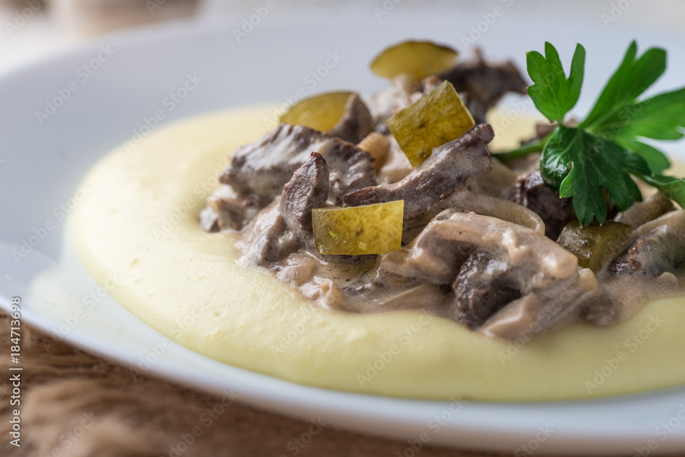 Beef stroganoff out of marbled beef with mashed potatoes