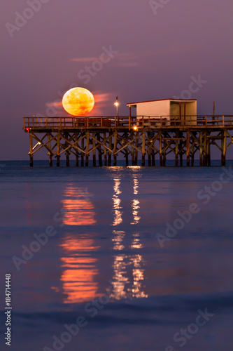 Moon Setting over Fishing Pier, on the Gulf of Mexico, Florida