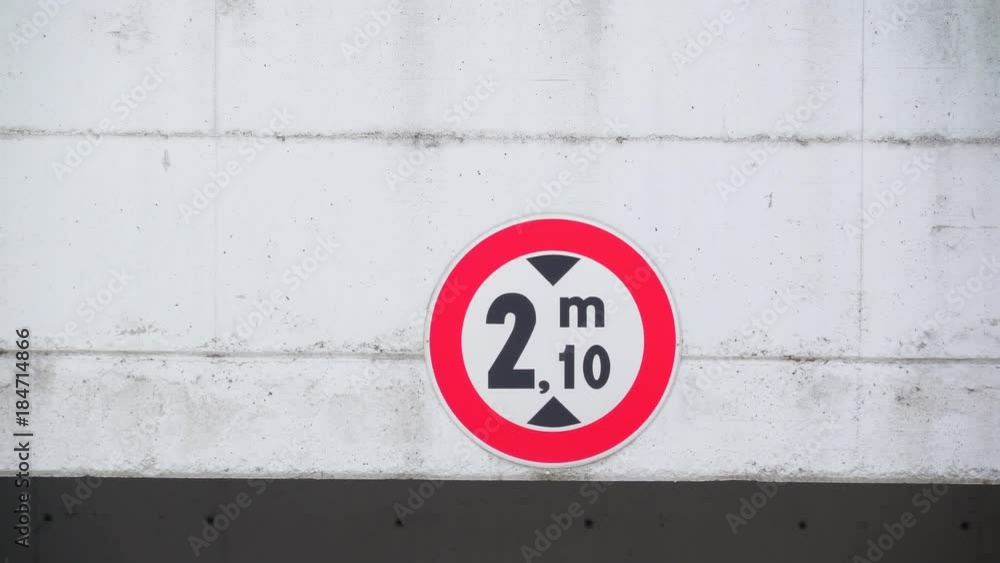 15625_A_red_signage_on_the_white_wall_of_the_parking_lot.mov 15625_A_red_signage_on_the_white_wall_of_the_parking_lot.mov