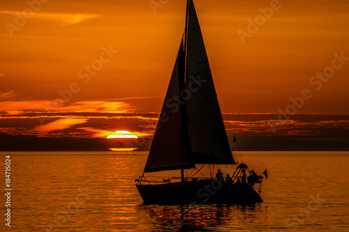 Sailboat at Florida Sunset in Gulf of Mexico. 