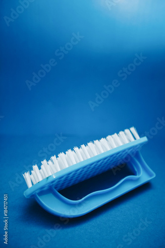 Blue clothes brush