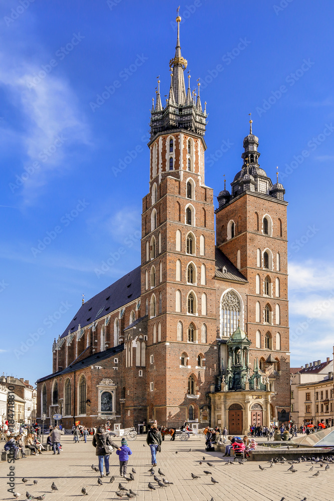 KRAKOW, POLAND - FEBRUARY 27, 2017: Mariacki church, Church of Our Lady Assumed into Heaven, a brick gothic church adjacent to the Main Market Square