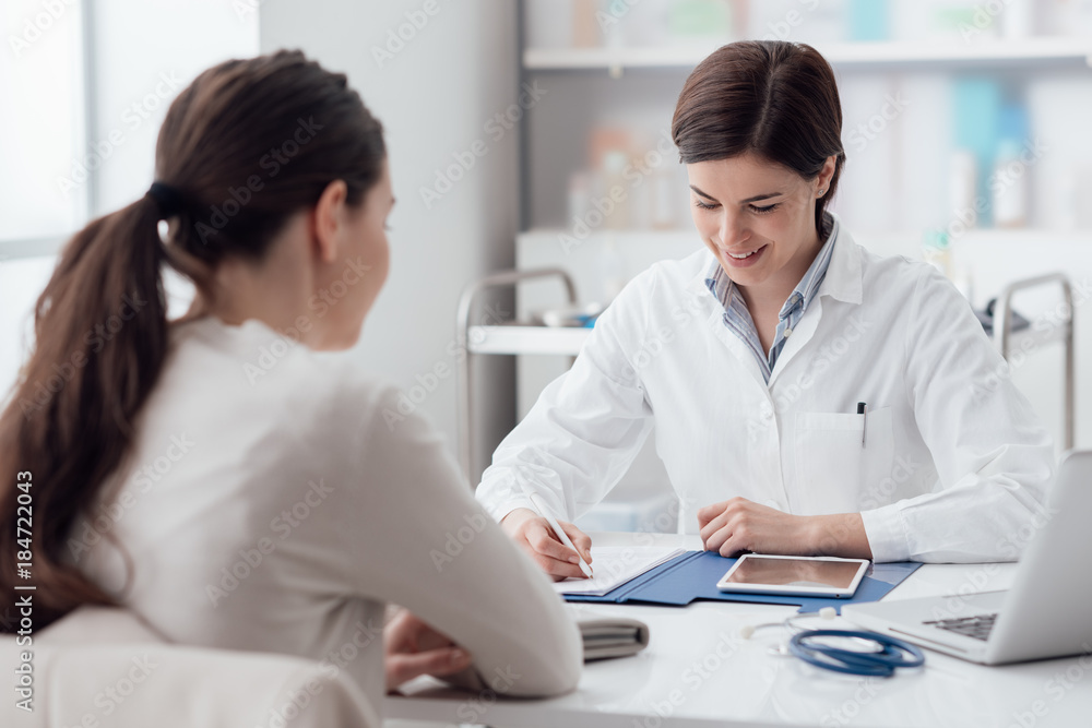 Fototapeta premium Doctor giving a prescription