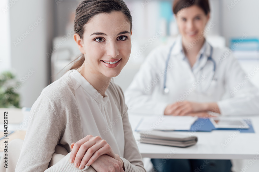 Fototapeta premium Smiling patient in the GP's office