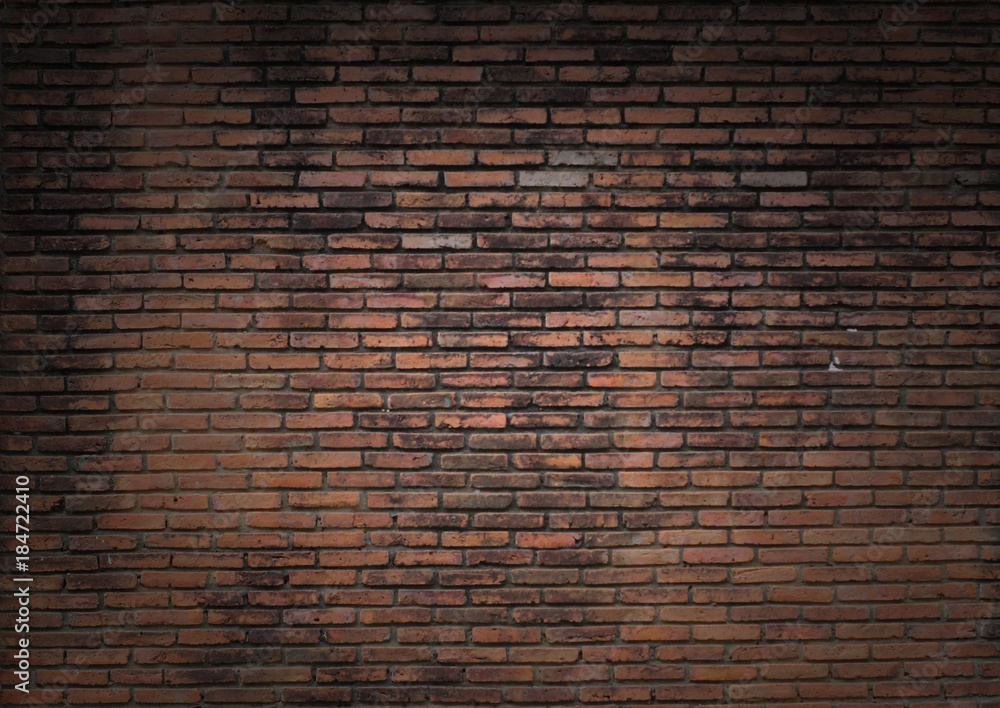 dimly lit old brick wall Stock Photo | Adobe Stock