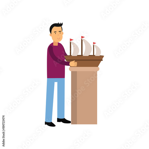 Smiling man character making model of sail boat. Male creative hobby. Vector flat cartoon illustration isolated on white.