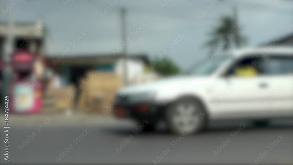 Vehicles drive in African, city, soft focus Vehicles drive in African, city, soft focus