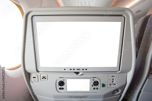 Aircraft monitor in passenger seat isolated on white background