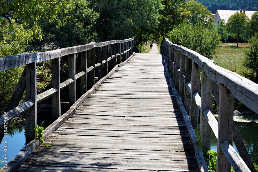 Obraz premium Bridge over the Krka river in Kostanjevica na Krki