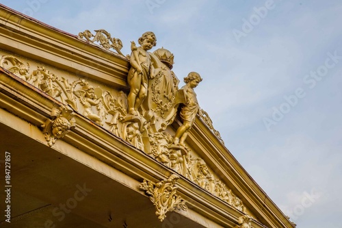 Historic Dutch ornament on a colonial building in Surakarta, Java, Indonesia photo