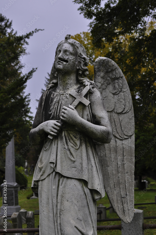 Angel Statue in a Graveyard