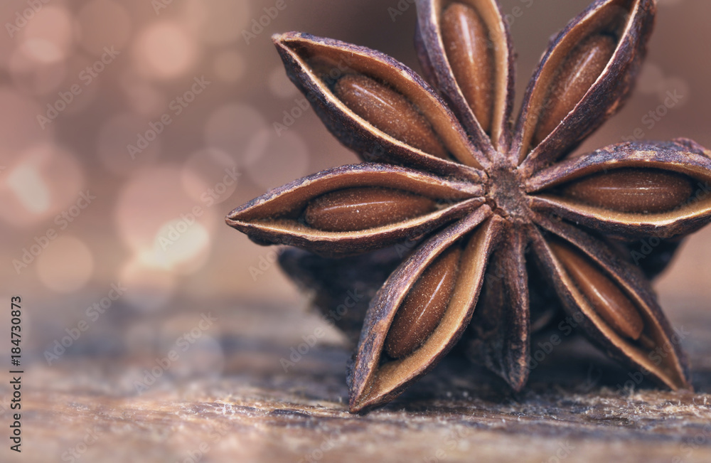 closeup on star anise on blur light background closeup on star anise on blur light background