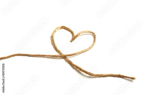 Top view of a rope in a heart shape isolated on white background.