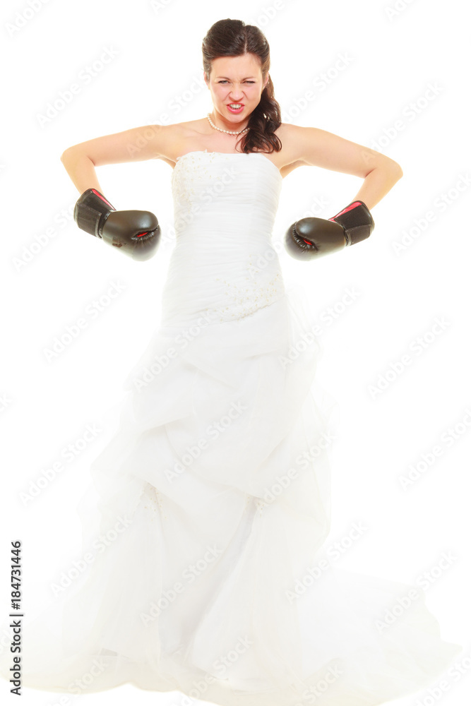 Bride wearing wedding dress and boxing gloves Bride wearing wedding dress and boxing gloves