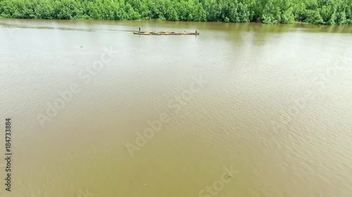 Long boat in Wouri Delta canal, aerial photo