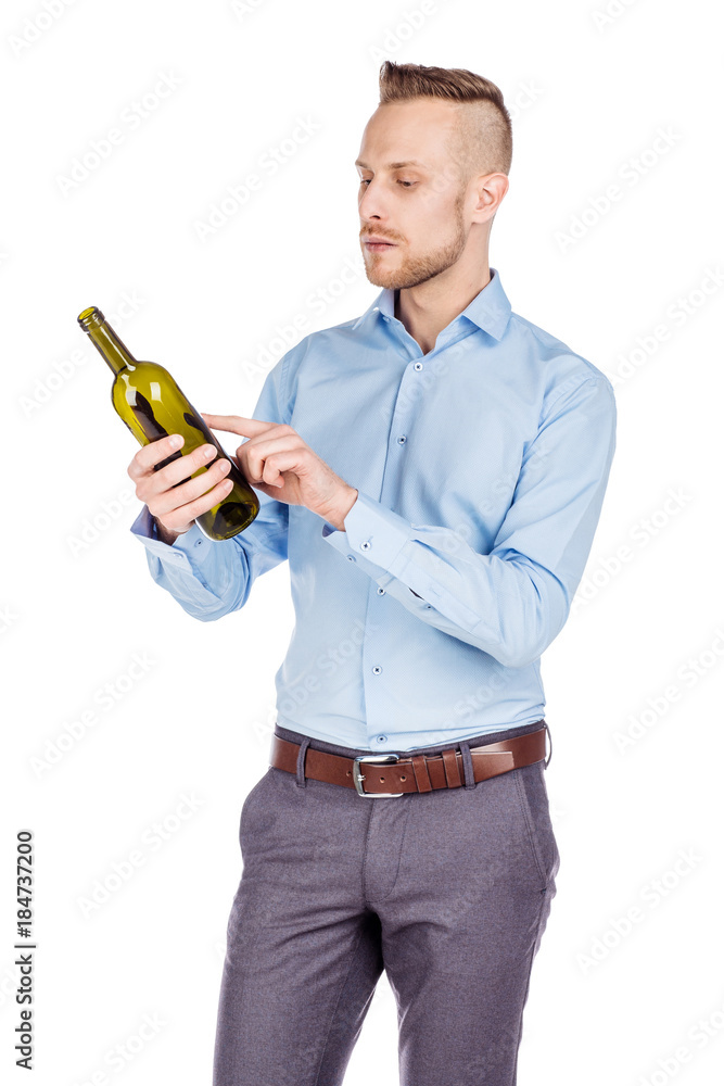 businessman holding bottle of wine isolated on white background... businessman holding bottle of wine isolated on white background...