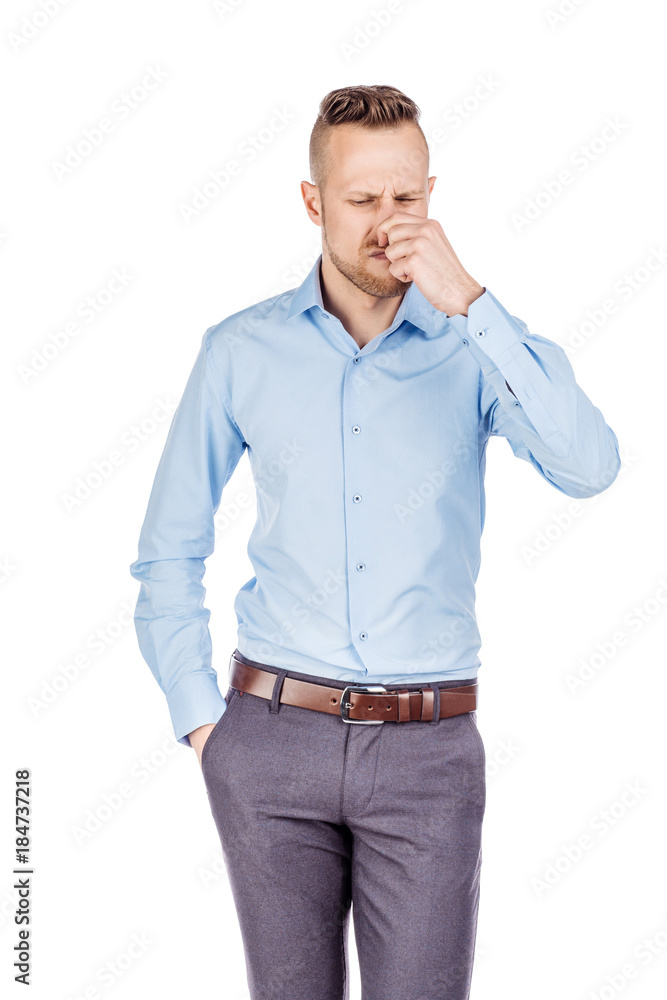 man holding dirty dirty diaper in one hand fingers over white background. Unpleasant smell stink. man holding dirty dirty diaper in one hand fingers over white background. Unpleasant smell stink.