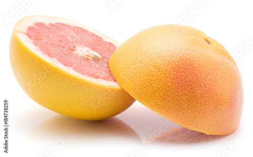 Sliced red grapefruit isolated on white background two halves. photo