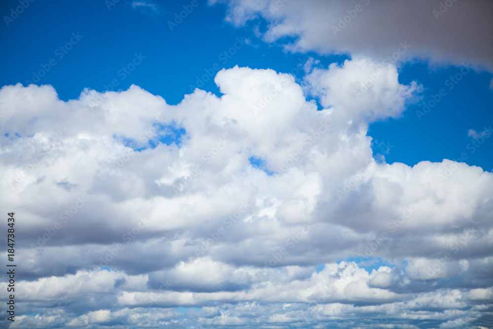 white cumulus clouds on a blue sky, New Mexico white cumulus clouds on a blue sky, New Mexico