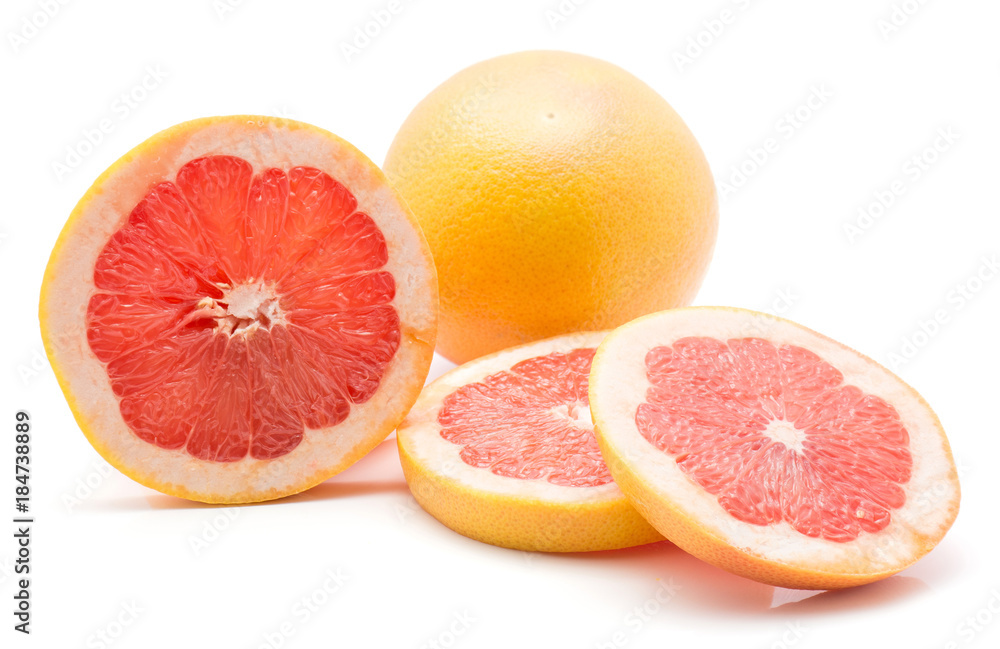 Sliced red grapefruit isolated on white background one whole three ring slices. Sliced red grapefruit isolated on white background one whole three ring slices.