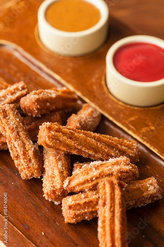 churos with dulce de leche and raspberry dipping sauce