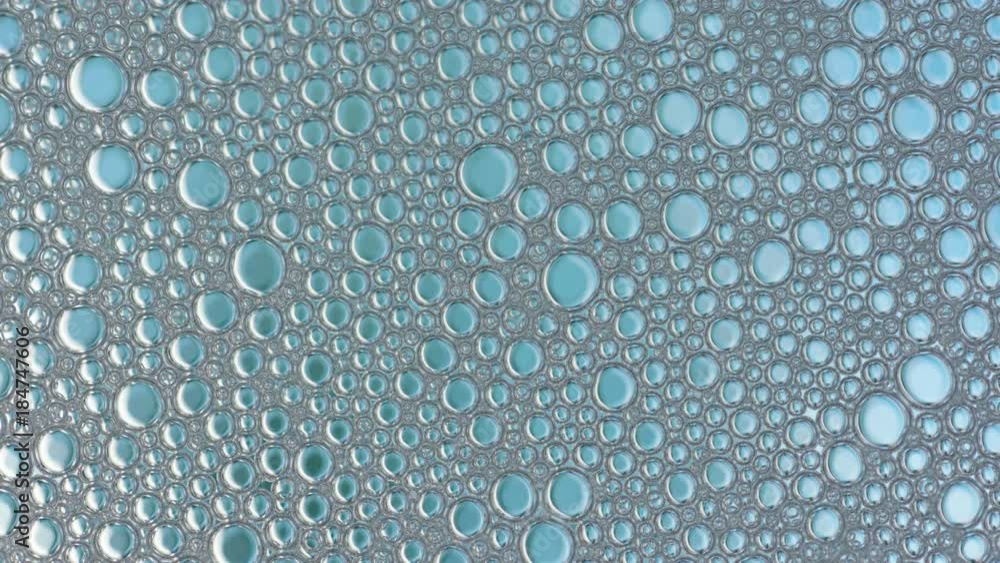 Macro shot Foam Bubble from Soap or Shampoo Washing disappear from the screen Macro shot Foam Bubble from Soap or Shampoo Washing disappear from the screen
