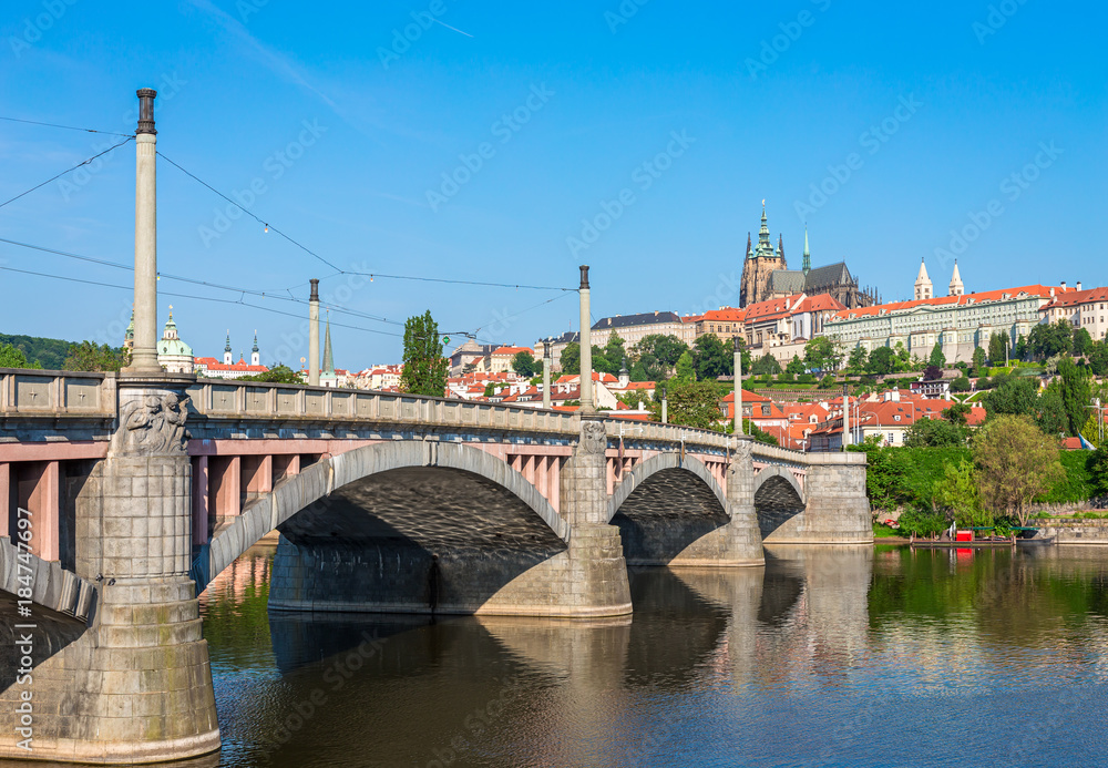 View of Prague Castle from Manes Bridge over Vltava river in Prague, Czech Republic
