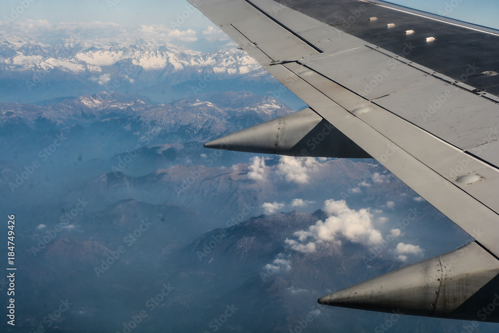 Obraz premium plane, blue, sky, nature, cloud, flight, horizon, window, beautiful, air, airplane, aircraft, white, light, glass, wing, outdoor, top, fly, high, earth, frame, view, cloudscape, travel, transport, bus