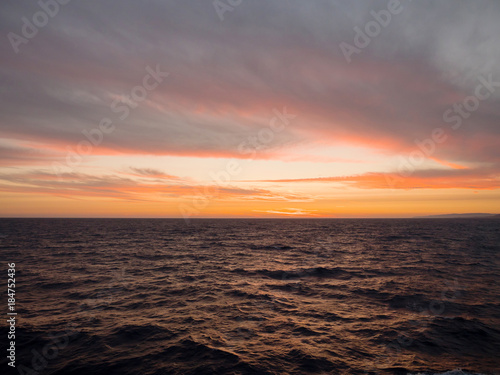 Beautiful sunset with clouds in the sea