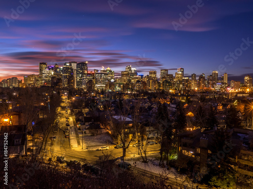 View of Calgary's skyline before sunrise.  View is from the bluff overlooking the Bow River and downtown. 
