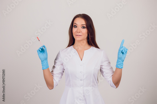 Beautiful female medicine doctor with smile face. Medical care, illness diagnosing, physical, physician consultation, insurance concept. Dermatologist or oncologist examination photo