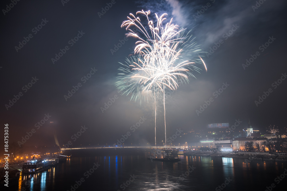 New Year Celebration. Fireworks on Danube River in Bratisalva, Slovakia New Year Celebration. Fireworks on Danube River in Bratisalva, Slovakia