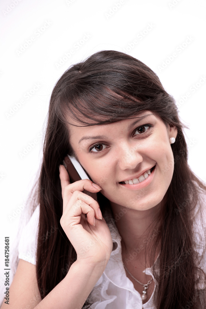 smiling young woman talking on a mobile phone smiling young woman talking on a mobile phone
