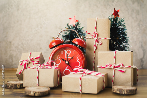 Tableau sur toile Paper gift box with pine tree accessory , Merry Christmas and Happy New year con