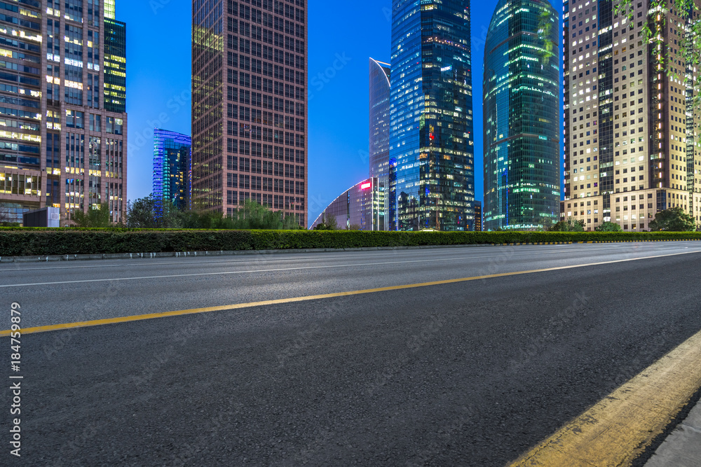 Empty asphalt road through modern city in Shanghai, China..