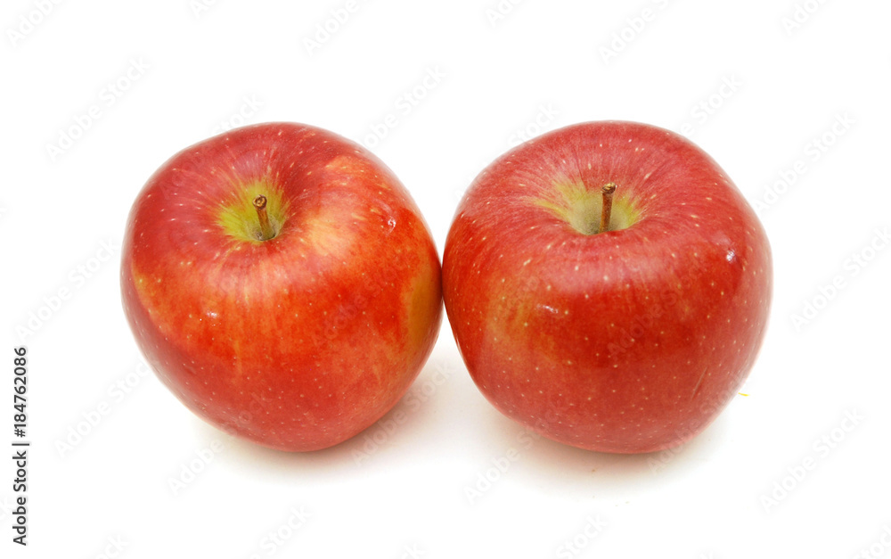 Ripe red apple. Isolated on a white background. Ripe red apple. Isolated on a white background.