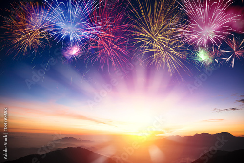  mountain with sunrise and fireworks background