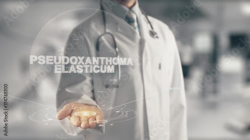 Doctor holding in hand Pseudoxanthoma Elasticum photo