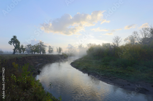 Fog over the river photo