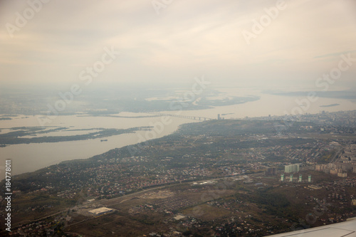 view from the airplane window to the city © Максим Михайловский