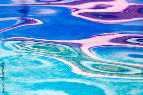 Fototapeta Naklejka Na Ścianę i Meble -  Abstract background of smooth water in the pool