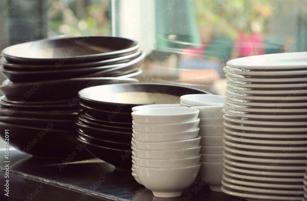 stack of white dishes stack of white dishes
