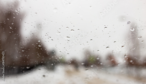 Drops on the car window in winter