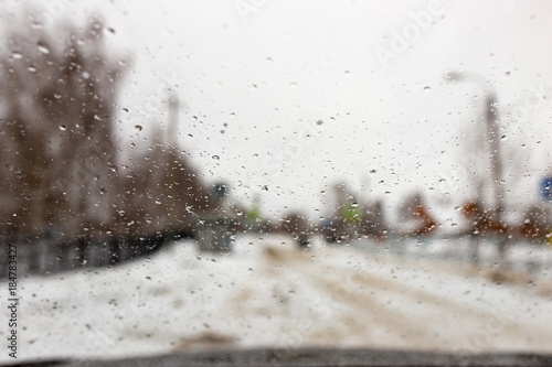 Drops on the car window in winter