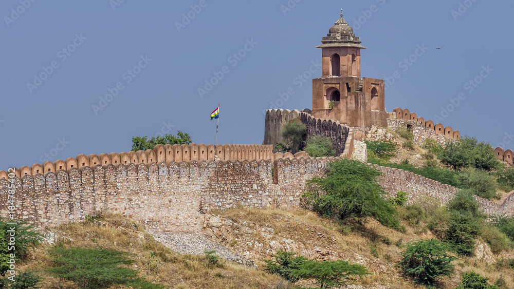 Defensive walls with Indian flag in the wind, Amber Fort, Amer, Jaipur, Rajasthan, India
