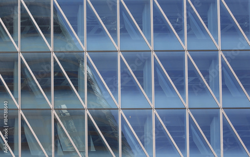 Abstract triangles windows with the reflection of other buildings in hong kong city,Central financial zone