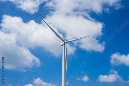Wind turbines behind the sky © fortyfour