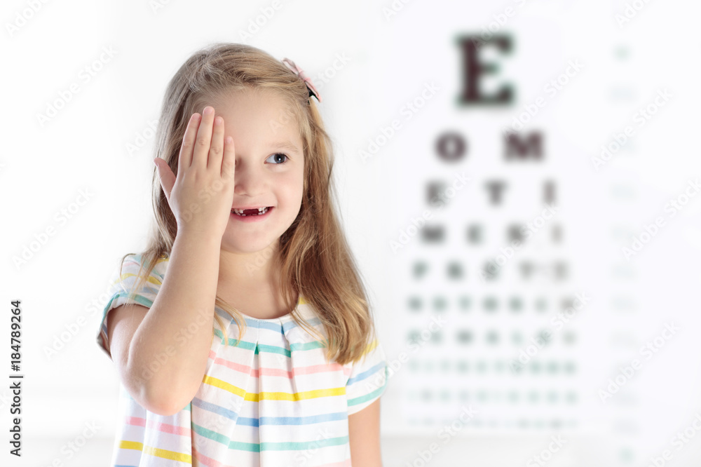 Child at eye sight test. Kid at optitian. Eyewear for kids. Child at eye sight test. Kid at optitian. Eyewear for kids.
